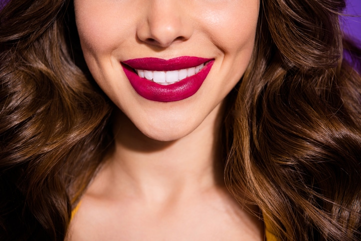 Cropped close up view of her she nice attractive adorable perfect cheerful cheery wavy haired lady plump sensual lips isolated over bright vivid shine violet lilac purple background