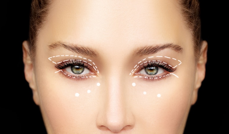 Perforation lines on females face, plastic surgery concept.